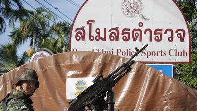 A Thai soldier takes up a position in front of the Royal Thai Police Sports Club in Bangkok. Chaiwat Subprasom / Reuters
