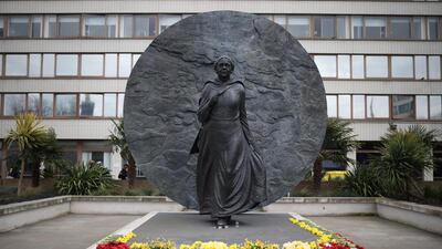 Flowers are seen at the Mary Seacole statue in the garden of St Thomas' Hospital in London. Reuters