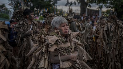 Devotees covered in mud and dried banana leaves take part in the Taong Putik ("mud people") Festival in the village of Bibiclat in Aliaga town, Nueva Ecija province, Philippines. Each year, the residents of Bibiclat village in Aliaga town celebrate the Feast of Saint John by covering themselves in mud, dried banana leaves, vines, and twigs as part of a little-known Catholic festival. Getty Images