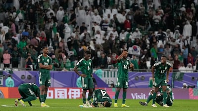 Saudi Arabia players after losing in the penalty shootout. AP