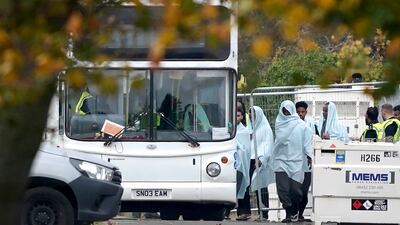 People thought to be migrants at the Manston processing centre. PA