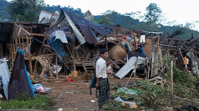 The aftermath of the strike on Mung Lai Hkyet displacement camp, in Laiza, north-eastern Myanmar, in which 29 people were killed. AP