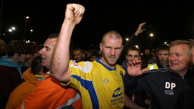 Craig Robinson of Warrington Town celebrates the win against Exeter City in the FA Cup first round on Friday. Jan Kruger / Getty Images