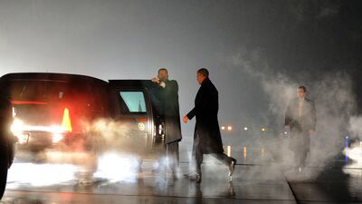 US president Barack Obama walks to his car upon arriving in Romules, Michigan (AFP Photo/Jewel Samad)