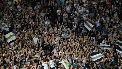 Bordeaux supporters celebrate after a goal during their club's match against Evian on Friday. Mehdi Fedouach / AFP / September 19, 2014
