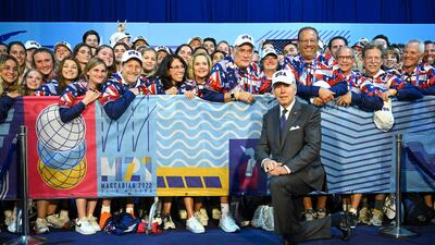 US President Joe Biden poses for a picture with US athletes competing in the Maccabiah Games. AFP
