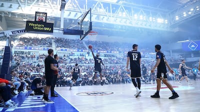The roof opens at Melbourne Arena as players warm-up ahead of the NBL match between Melbourne United and Cairns Taipans on Thursday, December 26. Getty.