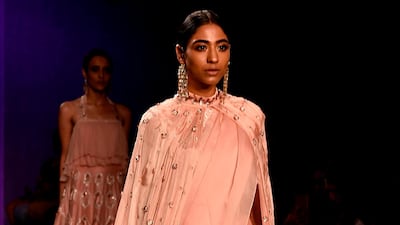 A peaches and cream emsemble by designer Mausumi Mewawalla at Lakme Fashion Week. Photo: Sujit Jaiswal / AFP