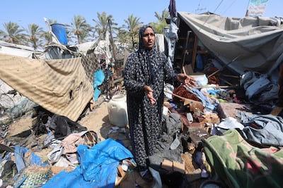 A Palestinian woman at the site of an Israeli strike on a tent in Gaza. Reuters