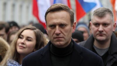 Russian opposition leader and anti-corruption activist Alexei Navalny (C) takes part in a memorial march for Boris Nemtsov marking the fifth anniversary of his assassination in Moscow, Russia, February 29, 2020. EPA