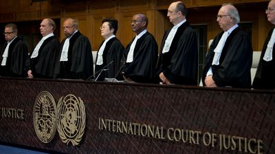 Judges enter the International Court of Justice in The Hague, Netherlands. AP