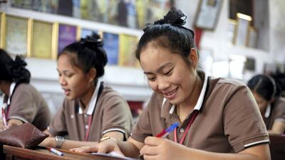 Pang, one of the students, smiling in class. Sasamon Rattanalangkarn for The National