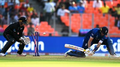 Joe Root of England is bowled by Glenn Phillips of New Zealand. Getty