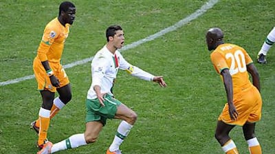 It was a frustrating game for Cristiano Ronaldo, centre, against the Ivory Coast.