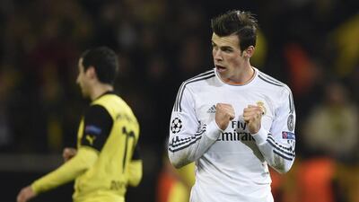 Real Madrid forward Gareth Bale celebrates after the Champions League quarter-final to advance over Borussia Dortmund to the semi-finals on Tuesday. Odd Andersen / AFP / April 8, 2014