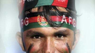 Fans celebrate during the game between Balkh Legends and Paktia Panthers in the Afghanistan Premier League. Chris Whiteoak / The National