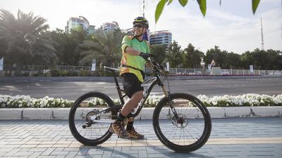 Therapist Rodel Rodriguez has cycled to work for the past three years. But on January 13, 2015 he was far from alone as many other UAE residents opted for two wheels for the trip to work. Mona Al Marzooqi / The National