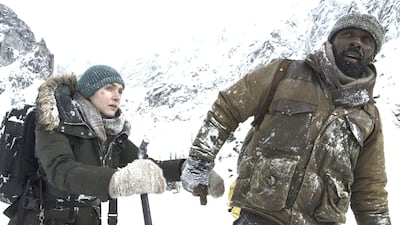 Kate Winslet, left, and Idris Elba play stranded survivors of a plane crash in The Mountain Between Us. Kimberley French / Twentieth Century Fox