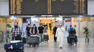 Arrivals at Kuwait International Airport in Kuwait City. Covid-19 vaccine and PCR test requirements are ending for incoming passengers. EPA