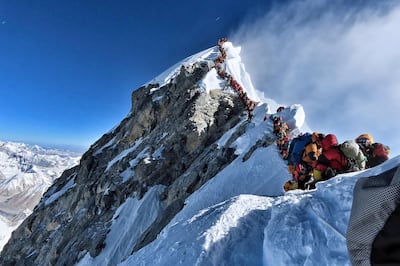 An image from climber Nirmal Purja's Project Possible shows heavy traffic of mountain climbers lining up to stand at the summit of Mount Everest, in 2019. AFP