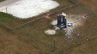 The Georgia Bureau of Investigation said the monument, which some Christians regard as satanic, was damaged by an explosion before dawn. WSB-TV / AP