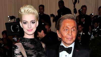 Anne Hathaway, left, and Valentino Garavani attends The Metropolitan Museum of Art's Costume Institute benefit celebrating "PUNK: Chaos to Couture". Charles Sykes / Invision / AP