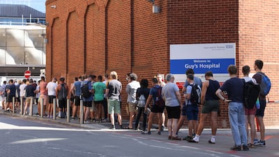 People line up to recieve monkeypox vaccinations at Guys Hospital in London. Getty Images