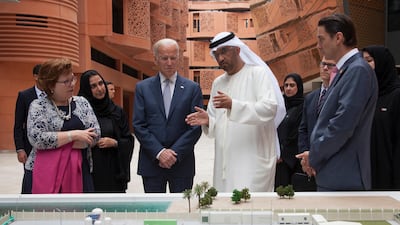 Mr Biden with Dr Sultan Ahmed Al Jaber UAE Minister of State and Chairman of Masdar (3rd R) during a tour of Masdar City. Seen with Reem Al Hashimy Minister of State for International Co-operation (R), Dr Nawal Al Hosany (3rd L) and Barbara Leaf, former US ambassador to the UAE (2nd L). Crown Prince Court - Abu Dhabi, March 7, 2016