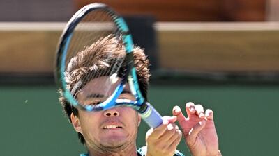 Taro Daniel hits a shot against Andy Murray during his match at the BNP Paribas Open at the Indian Wells Tennis Garden. Reuters