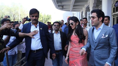 Indian businessman Akash Ambani and his fiancée Shloka Mehta arrive to attend the wedding of Bollywood actress Priyanka Chopra and Nick Jonas in Jodhpur, India, Saturday, Dec. 1, 2018. Photo: AP