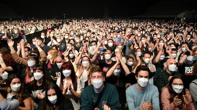 About 5,000 unvaccinated music lovers attended a trial indoor rock concert held in Barcelona last month. Scientists said there was almost no sign of Covid-19 transmission at the event. AFP