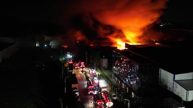 Fire tenders head to the site of an explosion in an industrial area of Ezeiza, Buenos Aires. Powerful blasts rocked the south of the Argentinian capital on the night of November 14, with at least 22 people sent to hospital. AFP