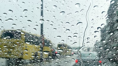 Rain batters off a windscreen. Pawan Singh / The National