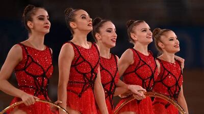 Team Bulgaria reacts after competing in the group all-around final.