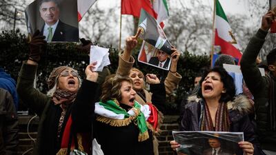 Anti-regime protestors demonstrate outside the Iranian embassy in London/ Getty
