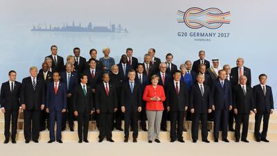 G20 leaders pose for a group photo. AFP Photo