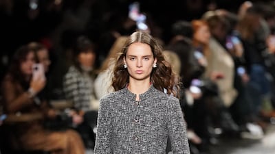 Delicate bejewelled belts complement the tweed. Getty Images