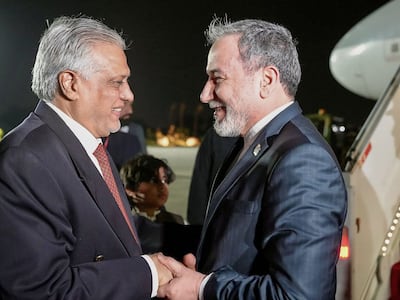 Pakistan’s Foreign Minister Ishaq Dar, left, with his Iranian counterpart Abbas Araghchi. AFP