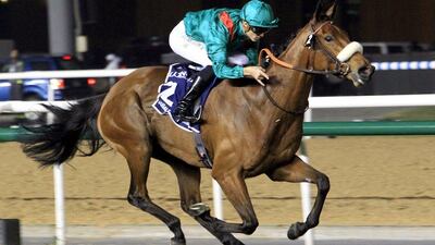 Christophe Soumillon, riding Dolniya of France, races to the finish line to win the Dubai Sheema Classic during the Dubai World Cup at the Meydan Racecourse in Dubai March 28, 2015. REUTERS/Martin Dokoupil