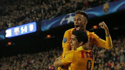 Luis Suarez celebrates with Neymar after scoring the second goal for Barcelona. Reuters / Albert Gea