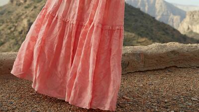 Windswept: Dress, Dh2,920, Ulla Johnson at Shopbop, ring Dh139, & Other Stories shoes, Dh1,950, Pucci. 