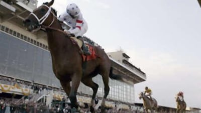 Big Brown, with jockey Kent J Desormeaux, crosses the finish line to win the 133rd running of the Preakness Stakes at Pimlico Race Course in Baltimore, Maryland, on 17 May, 2008.
