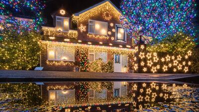 For over eleven years the residents of Trinity Close have decorated their homes and gardens with more than a 100,000 colourful Christmas lights. Getty