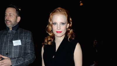 Jessica Chastain, in a black jumpsuit, attends the Viktor&Rolf autumn/winter 2013 show on March 2, 2013 in Paris. Getty Images