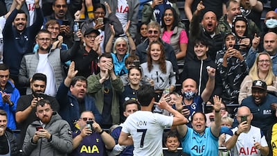 Tottenham Hotspur's striker Son Heung-Min celebrates scoring the opening goal.