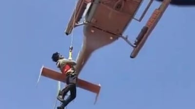 An Indian sailor is lifted to safety after the attack