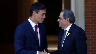 Spain Prime Minister Pedro Sanchez, left, and Catalan leader Quim Torra attempted to ease tensions. Reuters