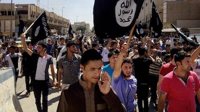 Demonstrators in Mosul chant support for ISIL. Photo: AP