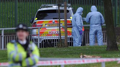 Police forensics officers search a cordoned off area in Woolwich, east London. A British company is among the pioneers that are creating smart ways to foil burglars and aid forensic investigations. Carl Court / AFP