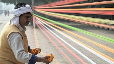 Coloured kite strings are arranged ahead of Lohri, the spring festival, in Amritsar, India. AFP